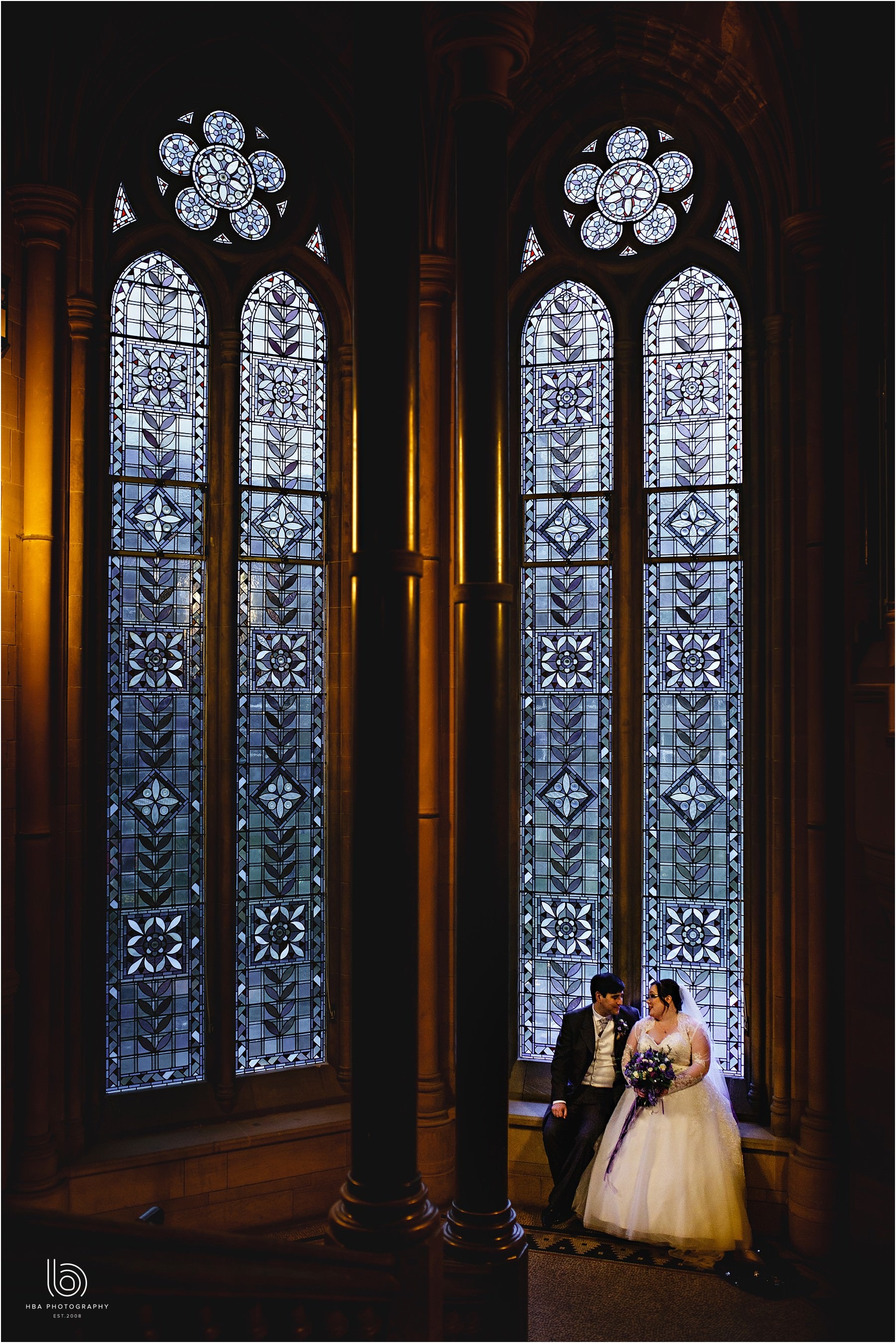 the bride & groom in the window