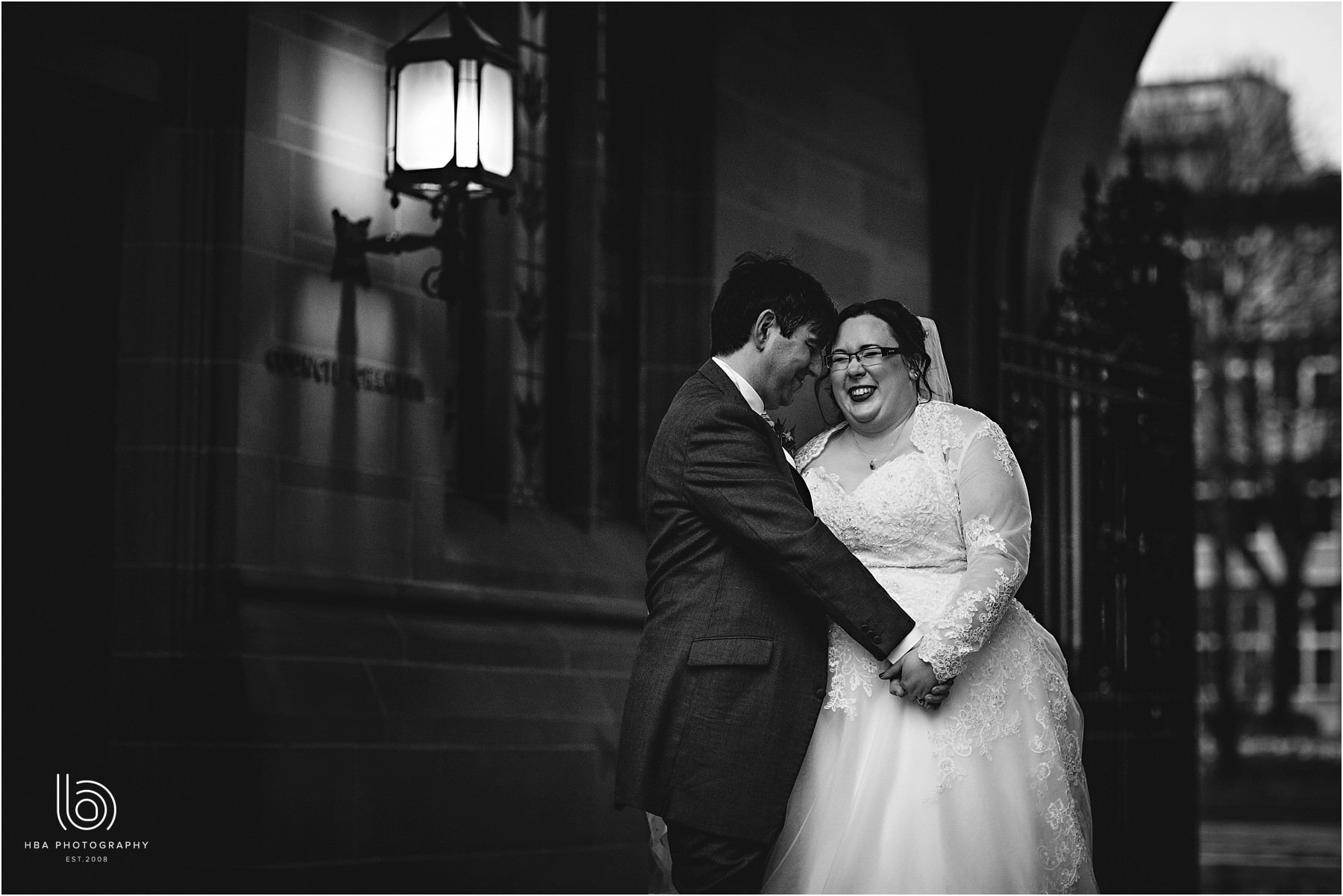 the bride & groom laughing