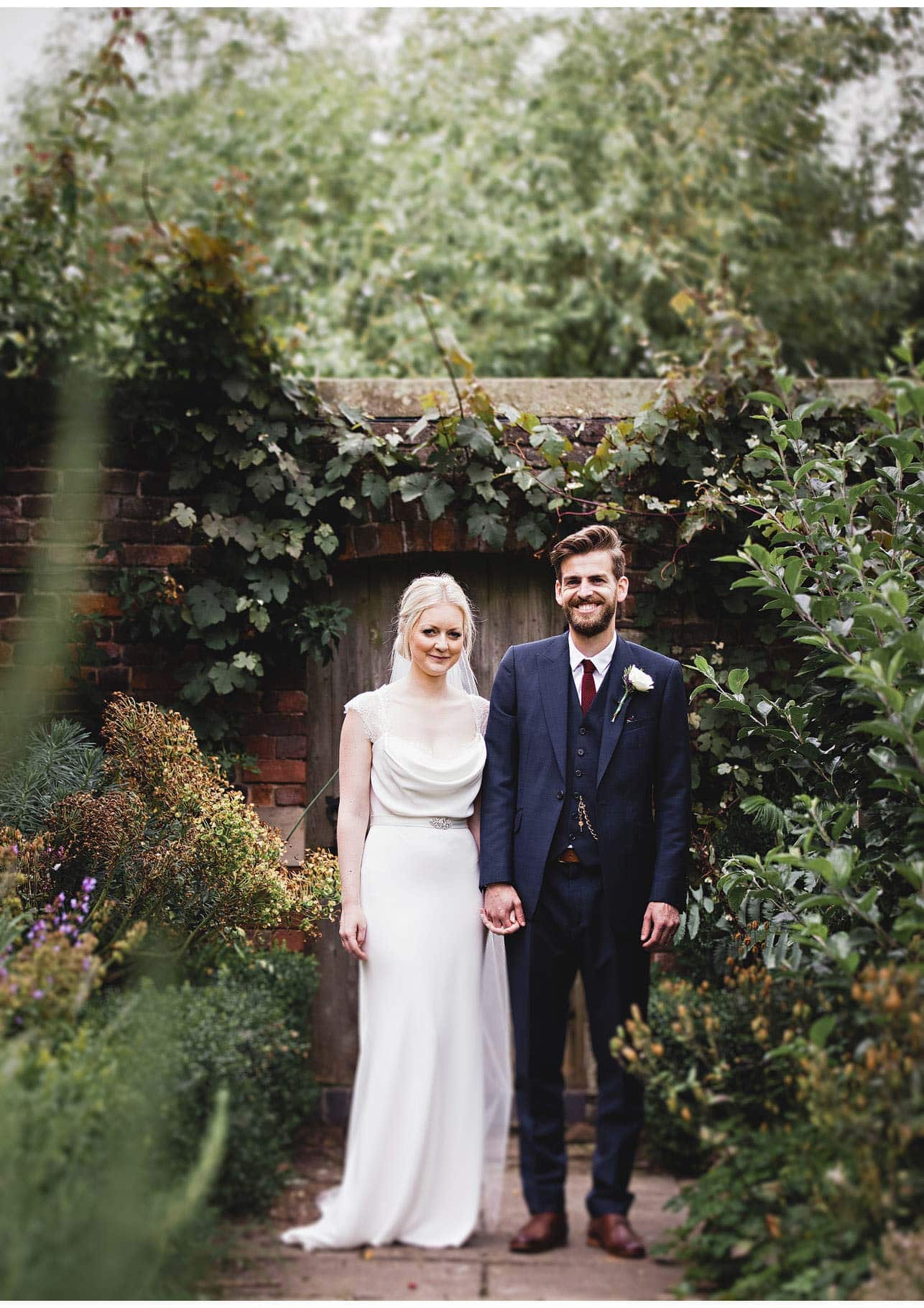 The bride & groom in the gardens