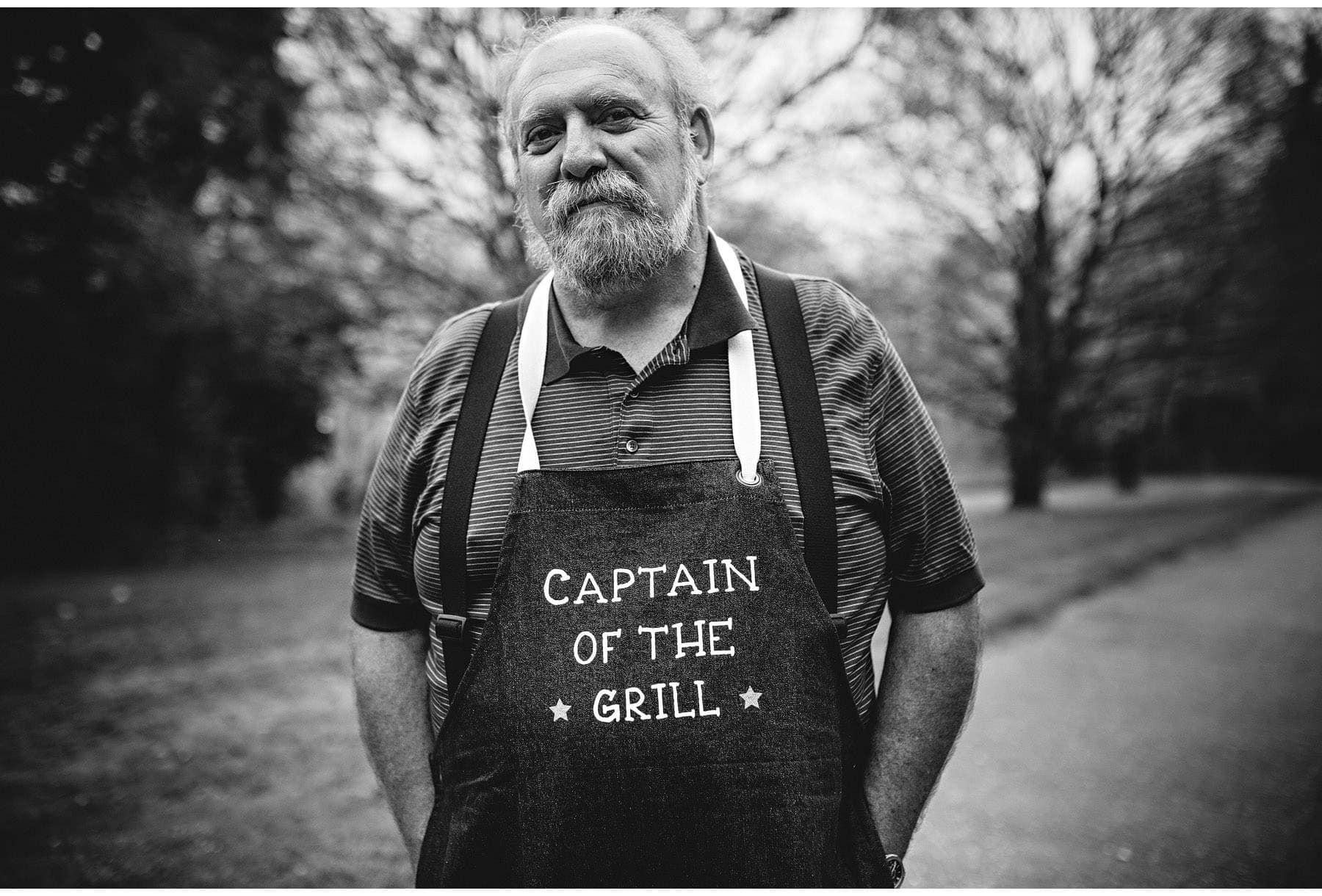 an american guest posing as the Captain of the Grill