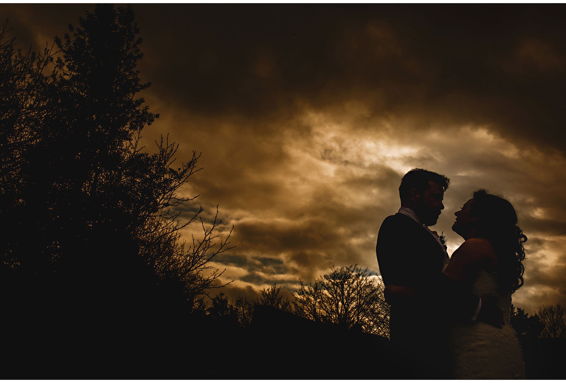 The bride & groom at sunset