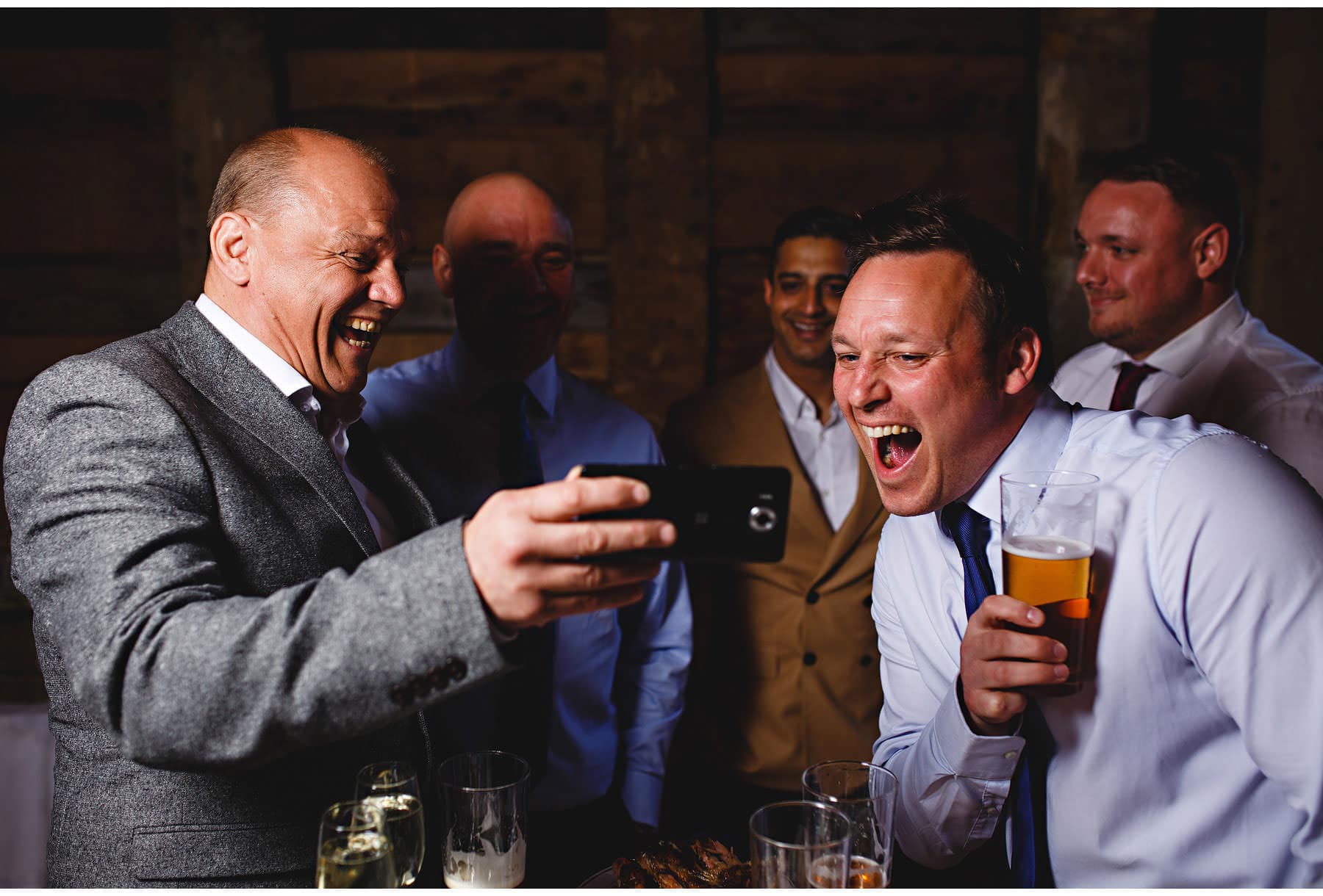 wedding guests laughing