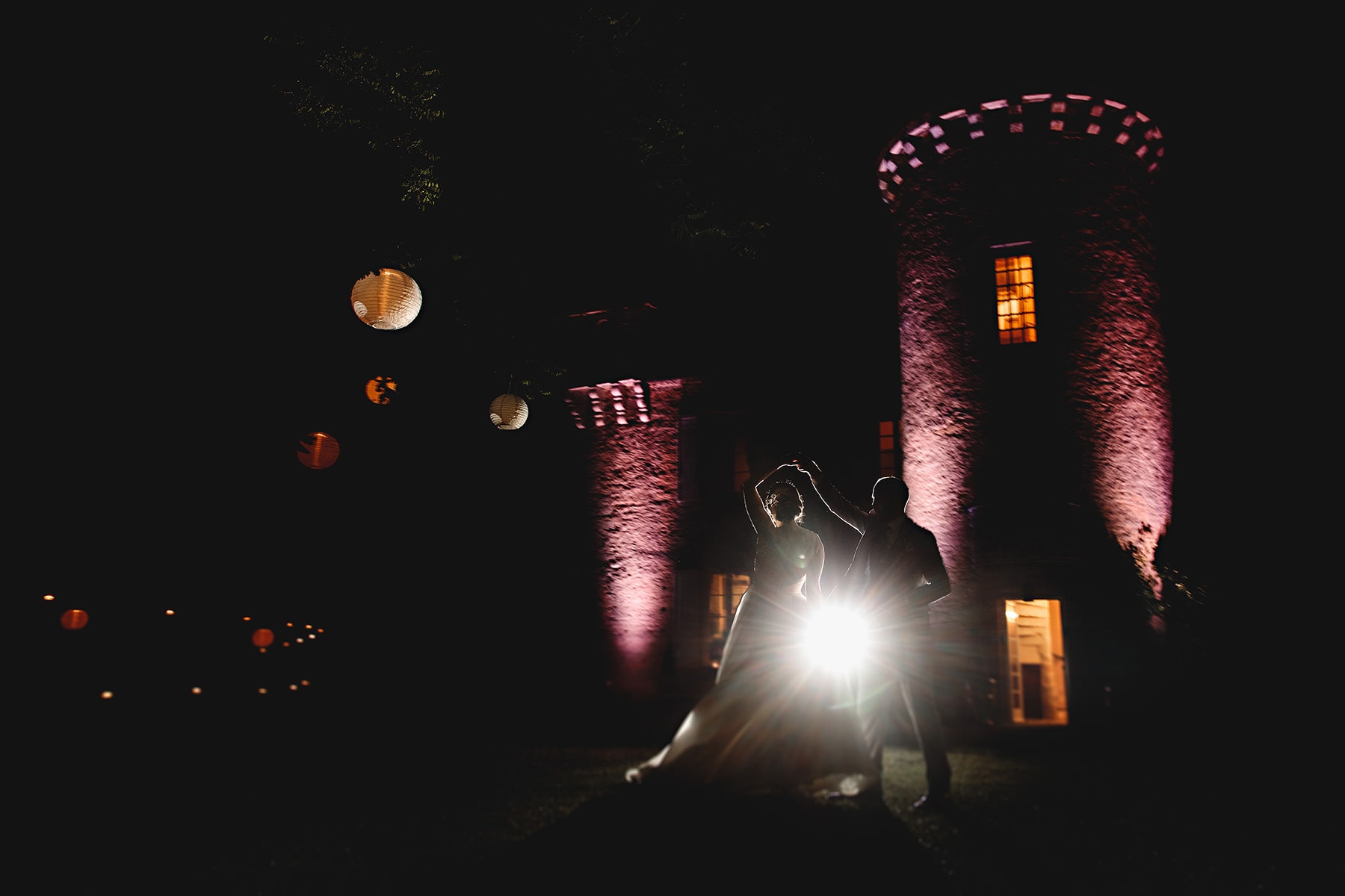 nighttime photos of the bride and groom dancing at the chateau cazenac in the dordogne