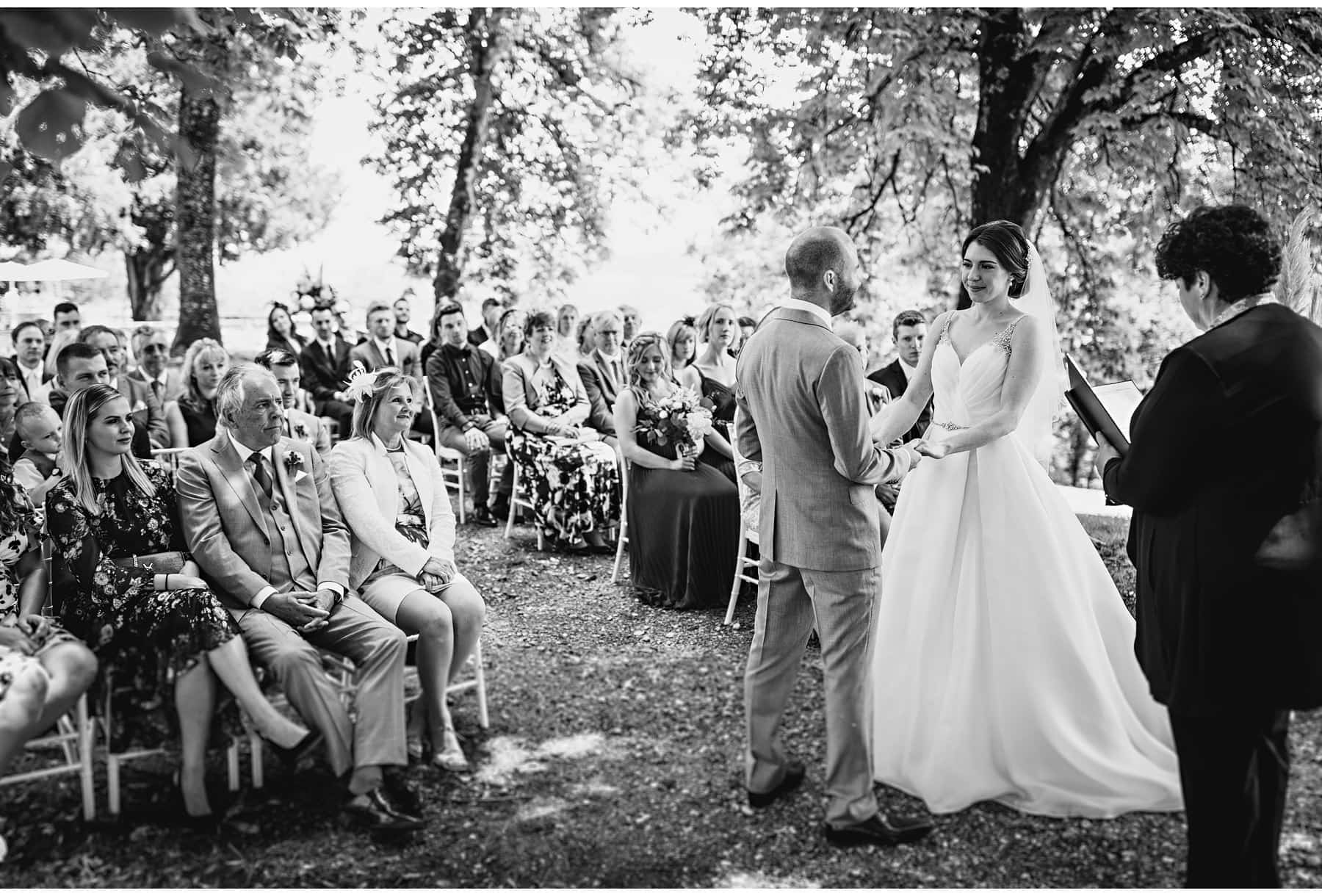 the bride & groom in the outdoor ceremony