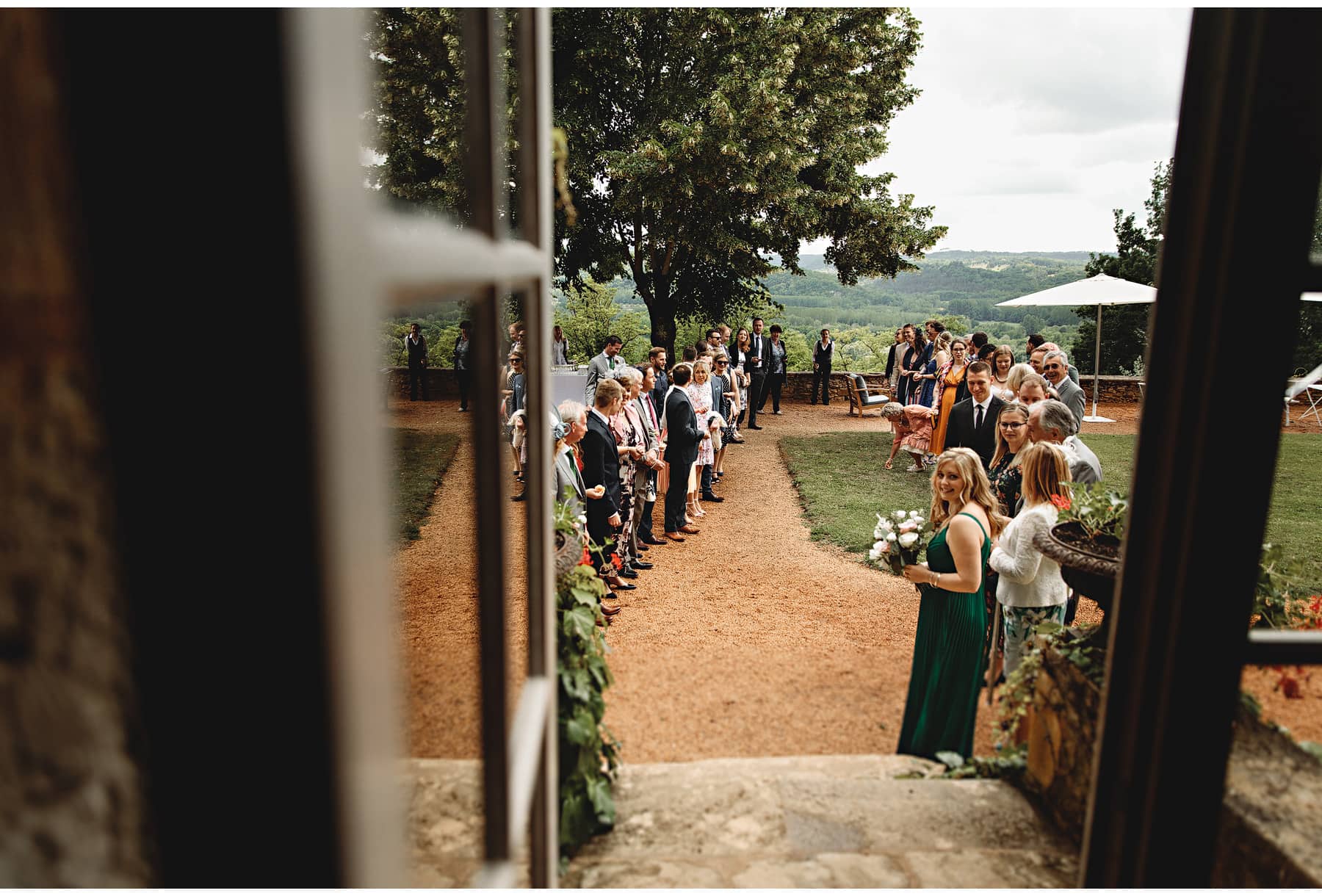 The wedding guests waiting to throw confetti