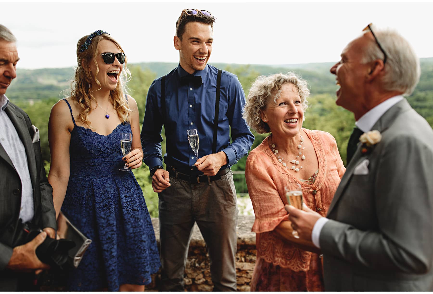 wedding guests laughing