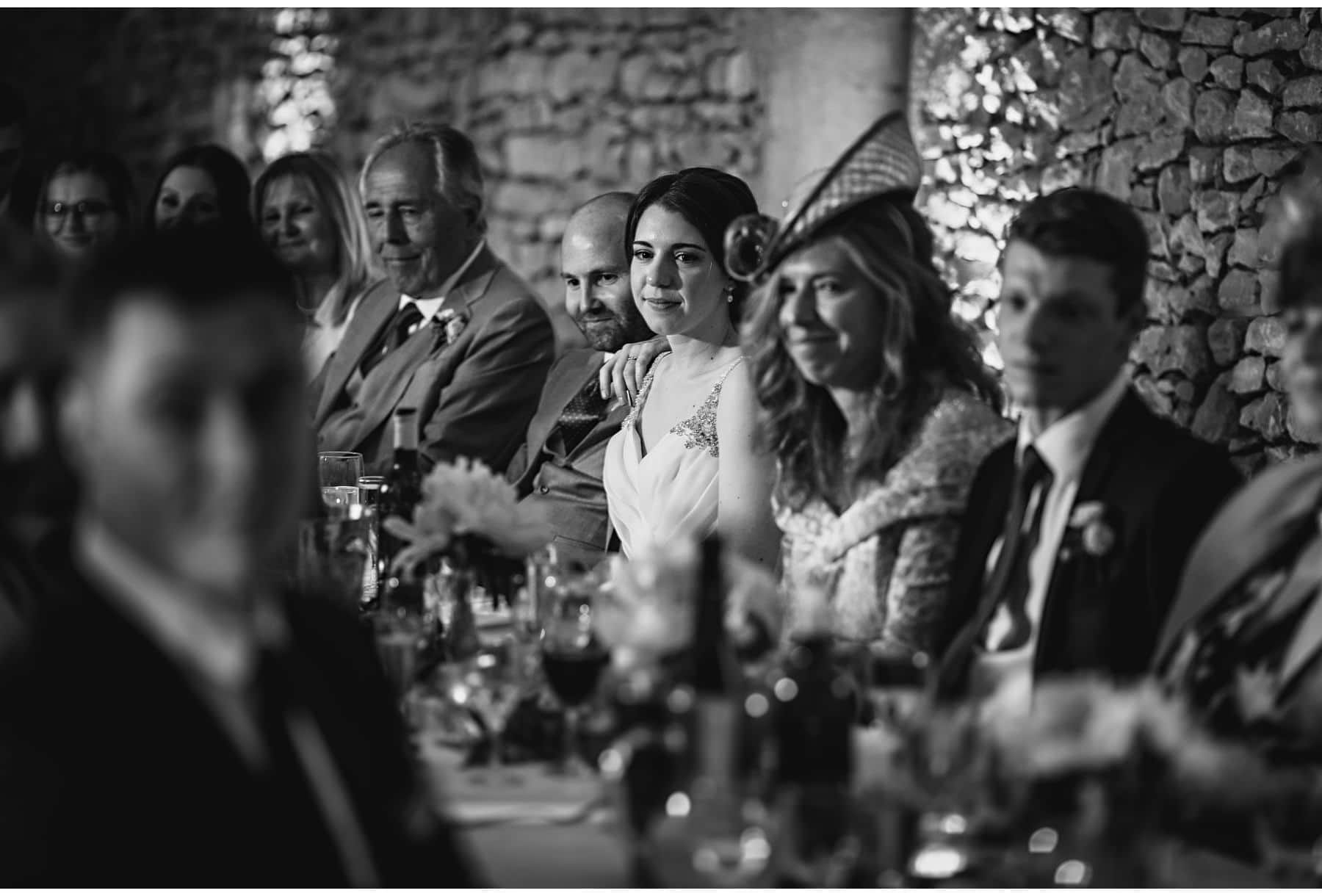 the bride & groom during the wedding speeches